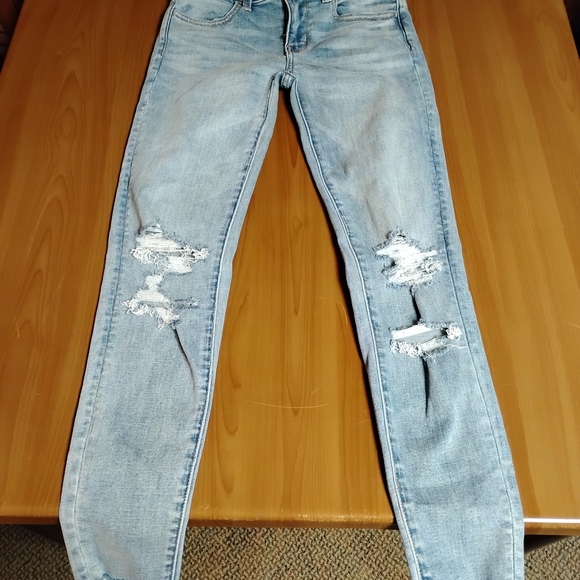 American Eagle Outfitters Denim - American Eagle Light Blue Ripped Jegging Super Stretch Jeans Size 0 25w